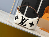 COUSSIN Plush Monogram Handbag