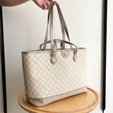 Ophidia series medium oatmeal-colored tote bag