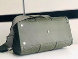 GG embossed leather travel bag