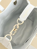 2026 Toujours Vertical Tote Bag in Smoky Blue, Small Size M2835OSOQ_M38Z