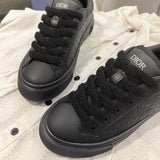 Men's B33 Low-Top Sneakers in Black Grained Calfskin and Black Leather| 3SN303ZAY_H900